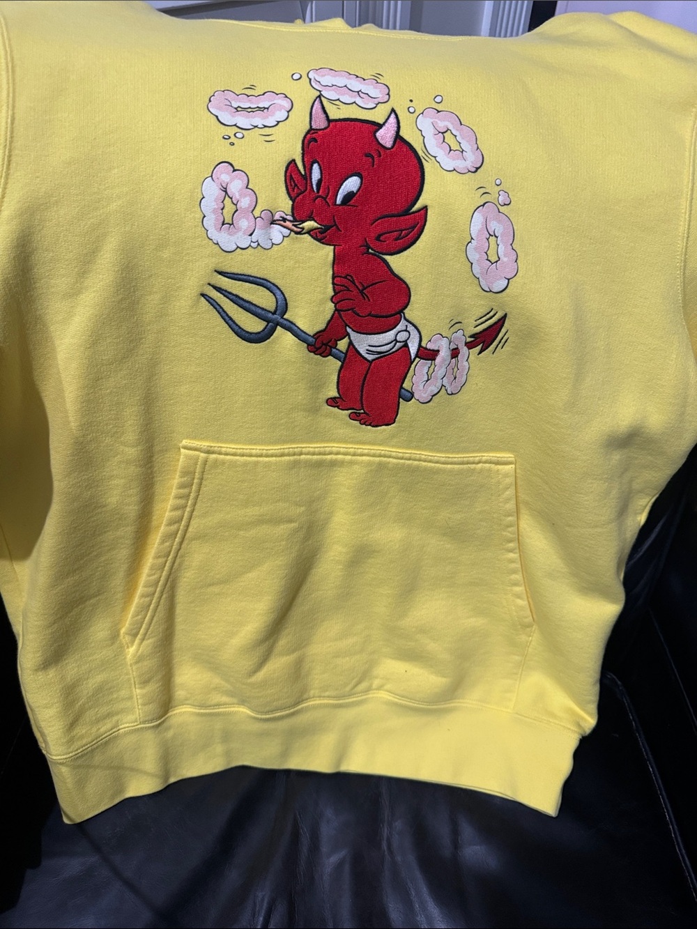 Sandro Yellow Hoodie with Red Devil Graphic